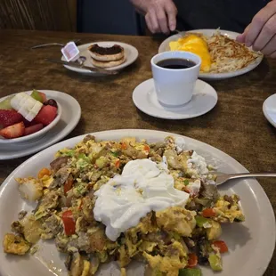 Italian scramble with fruit instead of toast. Then, English muffin with jelly is with the ham and cheese omlette and hashbrowns.