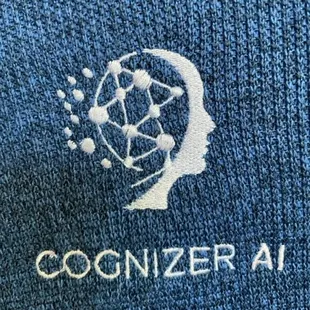 Our company logo embroidered on a jacket