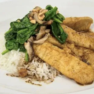 a plate of food with rice and spinach