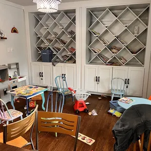 One of three rooms. This one includes indoor kids playing area and books