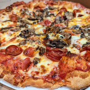 14-inch Loaded Pepperoni pizza ($21.49) with Mushrooms (+$1.25).