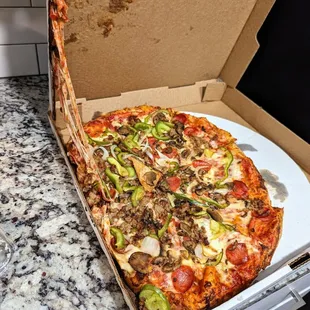 16-inch Classic. $25.99 + $2.00 for extra mushrooms, pre tax, delivery fee, and tip. Pizza shifted during delivery, but still tasted great.