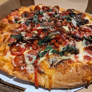 12&quot; Heartland. $17.49. Red sauce, cheese, pepperoni, bacon, balsamic caramelized onions, roasted red peppers, finished with Parmesan, basil.