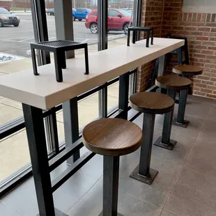 Window counter table seating area. #UpCloseSavor