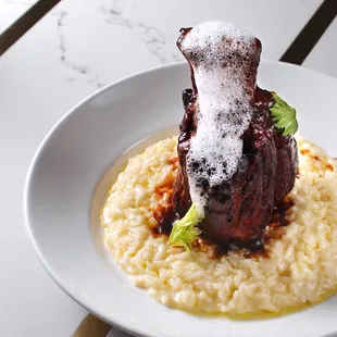 BRAISED PORK SHANK: parmesan risotto, celery hearts, reggiano foam, natural jus. More photos on IG: @damoneats