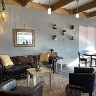 a living room with leather furniture