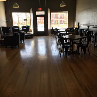 a large room with tables and chairs