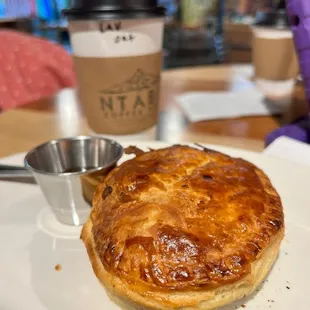 a pie and a cup of coffee