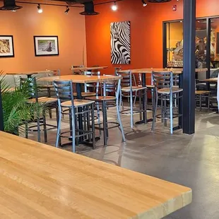 tables and chairs in a coffee shop