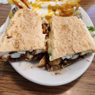 Grilled shrimp poboy with cheese fries