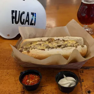 The Wiz-Wit cheesesteak with a side of hot peppers and extra mayo. Epic.