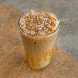 Stay cool and sweeten your day with our Iced Caramel Macchiato - a delightful blend of espresso, creamy milk, and decadent caramel.