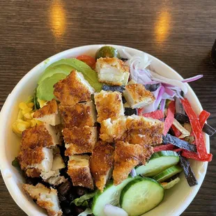 Build your own salad:chicken,avocado,cucumber,cherry tomatoes,red onion,corn,black beans and tortilla strips w/chili lime vinaigrette.