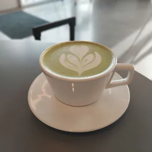 a cup of coffee on a saucer