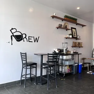 Another section of seating area- not occupied by customers hee.