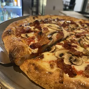 Mushroom bacon pizza. Definitely enough for two!