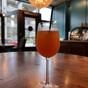 a glass of beer on a table