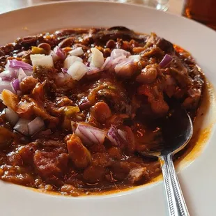 Bowl of Chili with onions and jalapenos is good