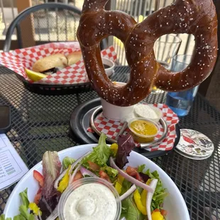 a pretzel and a salad