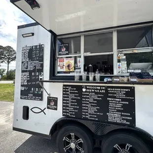 a food truck with menus