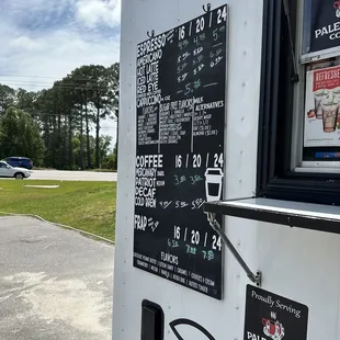 a menu on a food truck