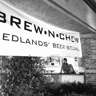 a man sitting at a window