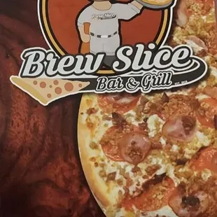 a man holding a pizza