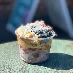 a cup of ice cream on a table