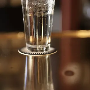 a glass of water on a table