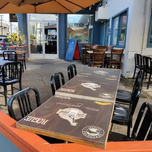 Outdoor dining in front of the entrance