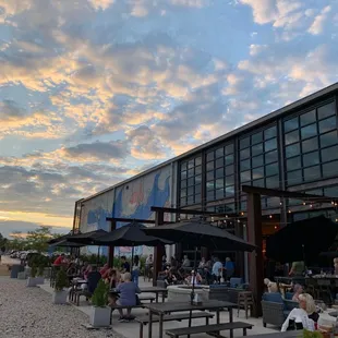 The garage doors were open and the patio was full.