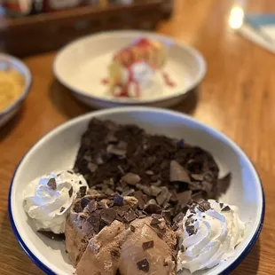 a bowl of ice cream and chocolate cake