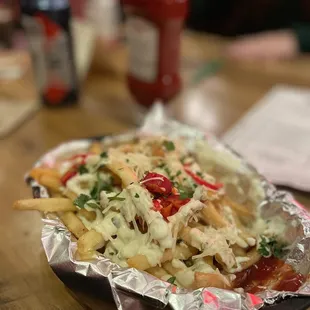 a plate of fries and ketchup