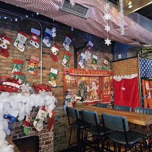 christmas decorations on a brick wall