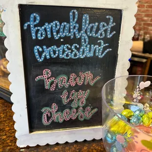 a chalkboard with a sign that says brew awake