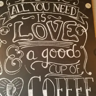 a chalk board with a quote