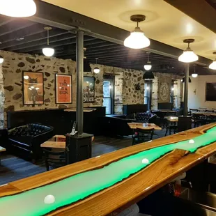 Indoor seating with custom bartop and tables