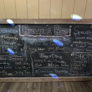 Chalk board with some of the specials that hangs behind the bar! Stop in and see what we have going on