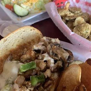 Chicken philly, sideline salad, fried pickles