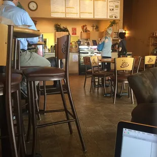 Comfortable corner seating! Right by a plug and a nice table (: I can read the menu from here in case I want to go back up!