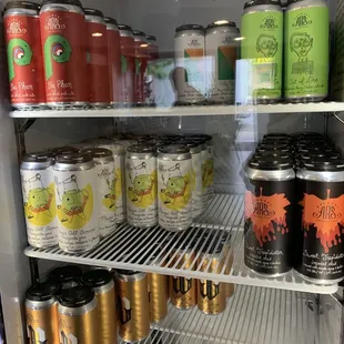 a refrigerator filled with cans of beer