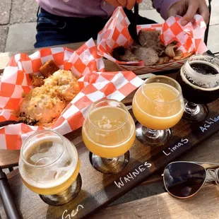 Flights and bbq brisket and cornbread Mac &amp; cheese enjoyed al fresco.