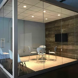 Dramatic, glass enclosed conference room for 4-8 people