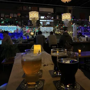 beer glasses on a bar counter