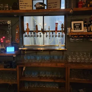 a row of beer taps