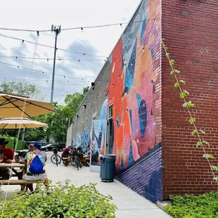 a colorful mural on the side of a building