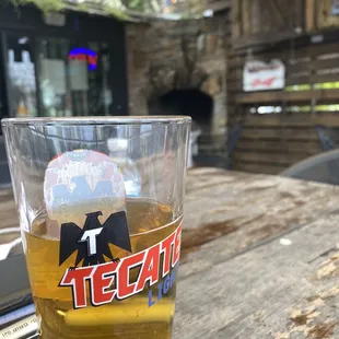 a glass of beer on a table