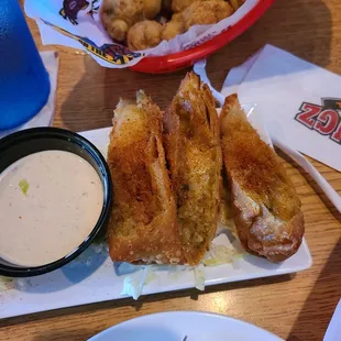 Boudin Egg Rolls and Fried Mushrooms