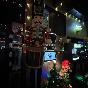 a nutcracker and a christmas tree