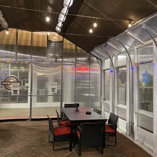 Outdoor, heated cigar smoking and drinking lounge!